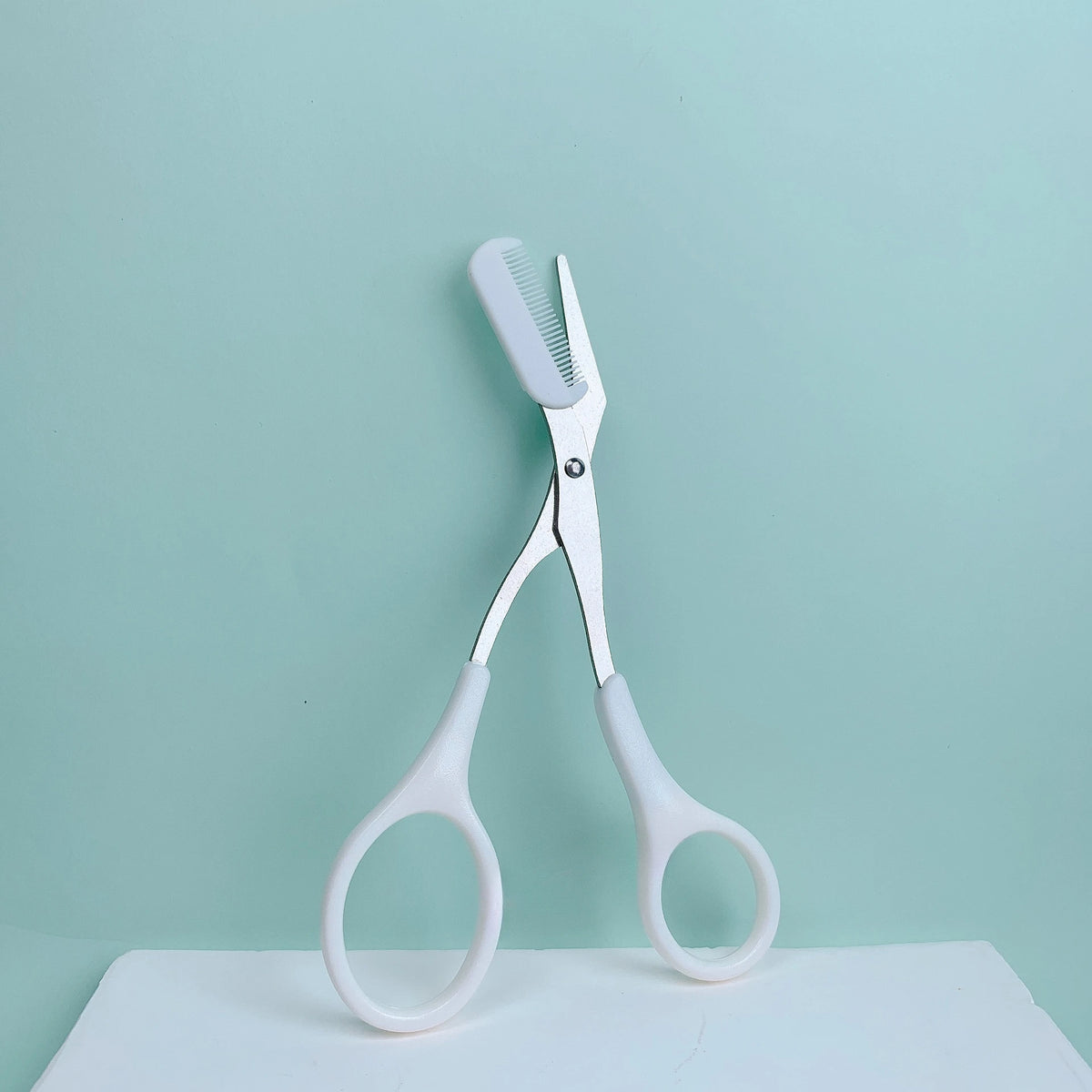 Eyebrow Trimming Scissors with Built-In Comb