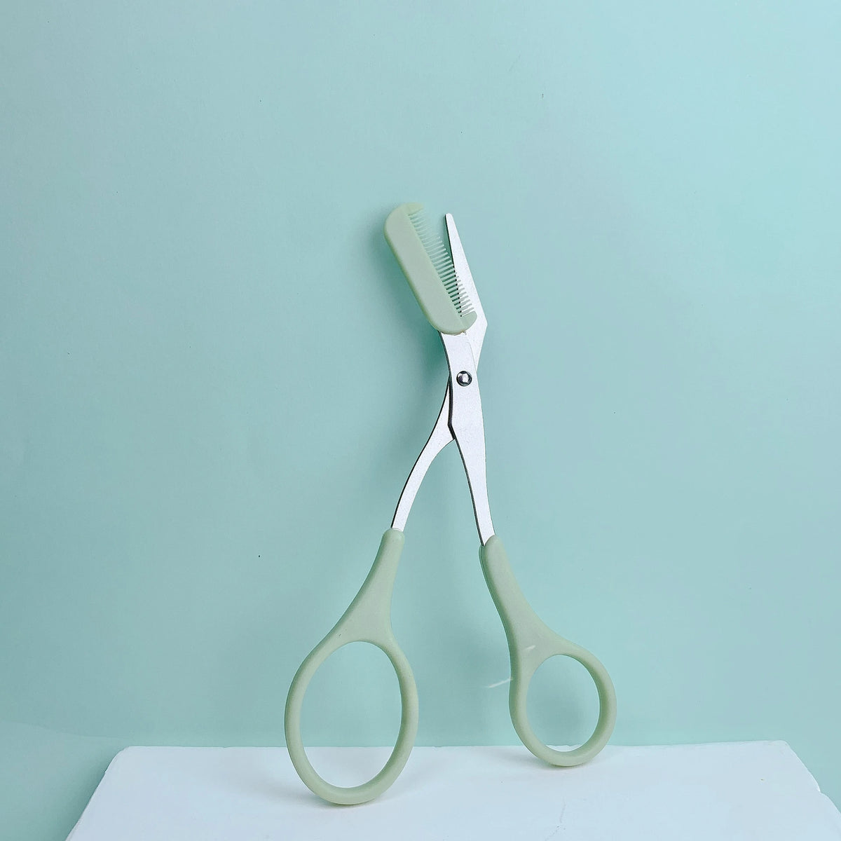 Eyebrow Trimming Scissors with Built-In Comb